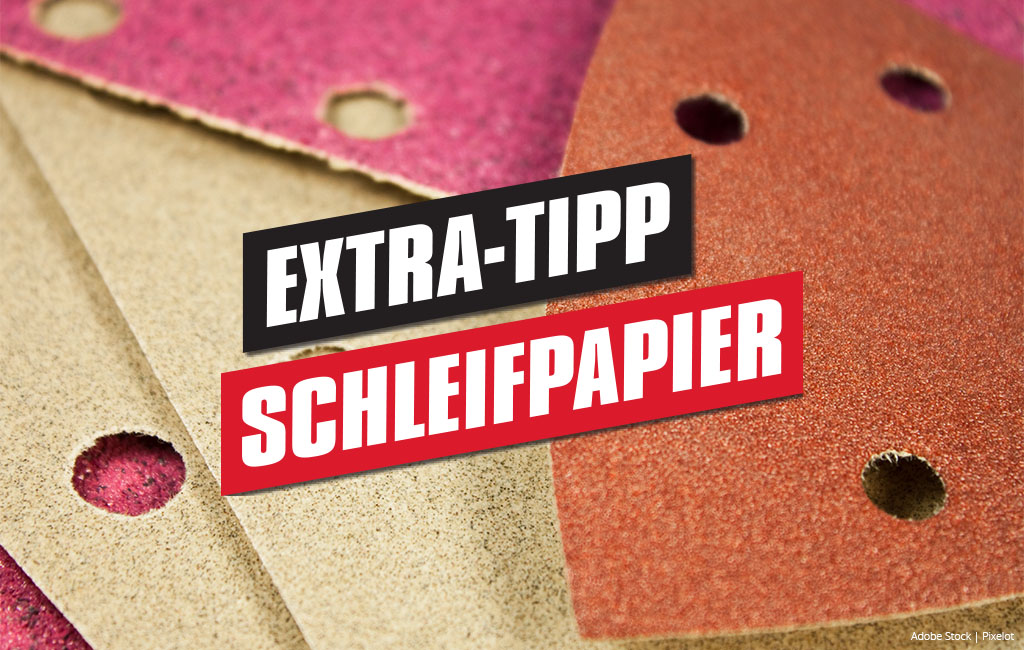 Verschiedene Schleifpapiere, im Vordergrund der Text: Extra-Tip-Schleifpapier