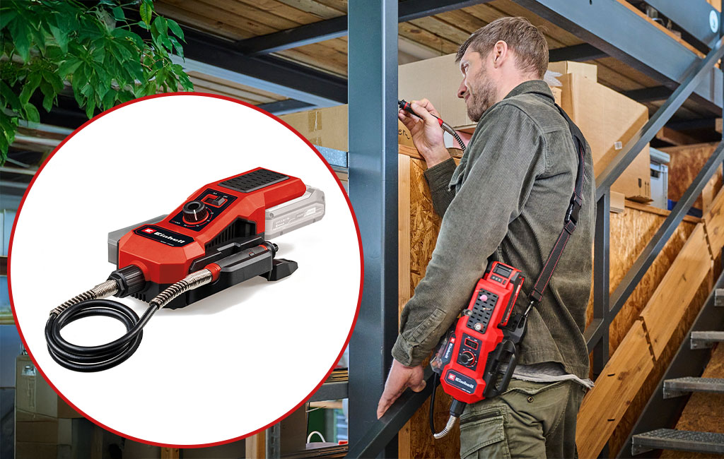 A man uses a red Einhell grinding and engraving tool with a flexible gooseneck to work on a surface in a storage area.