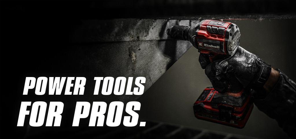 A hand holds a red cordless impact wrench being used on a metal beam, with the text "Power Tools for Pros".